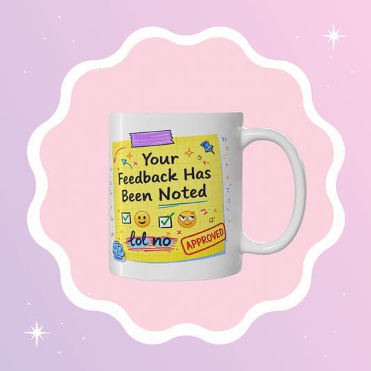 White ceramic mug with colorful designer-style doodles and the phrase Your Feedback Has Been Noted